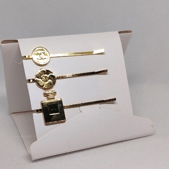 CHANEL Gold Hair Accessories Set with Elegant Designs - Picture 1 of 4